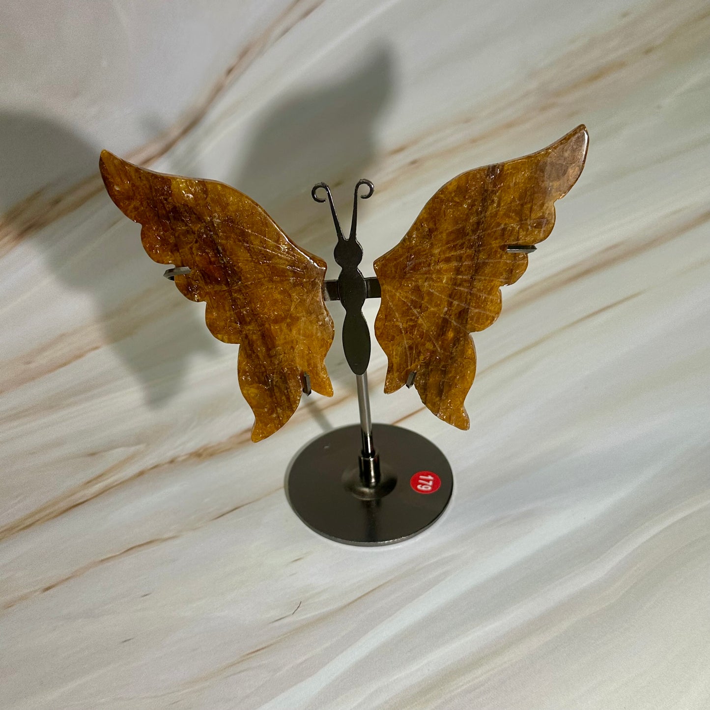 Golden healer vlinders op standaard