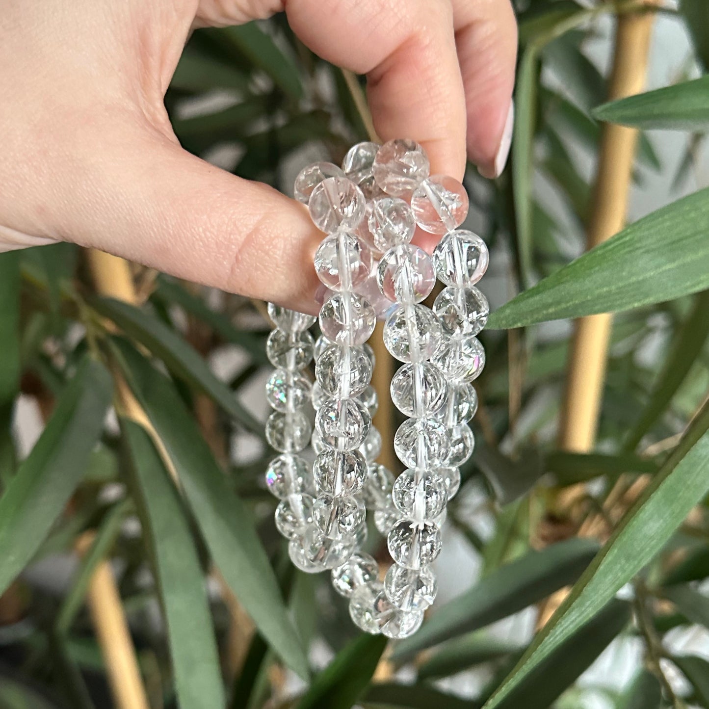 Bergkristal met regenboogjes armband 10mm