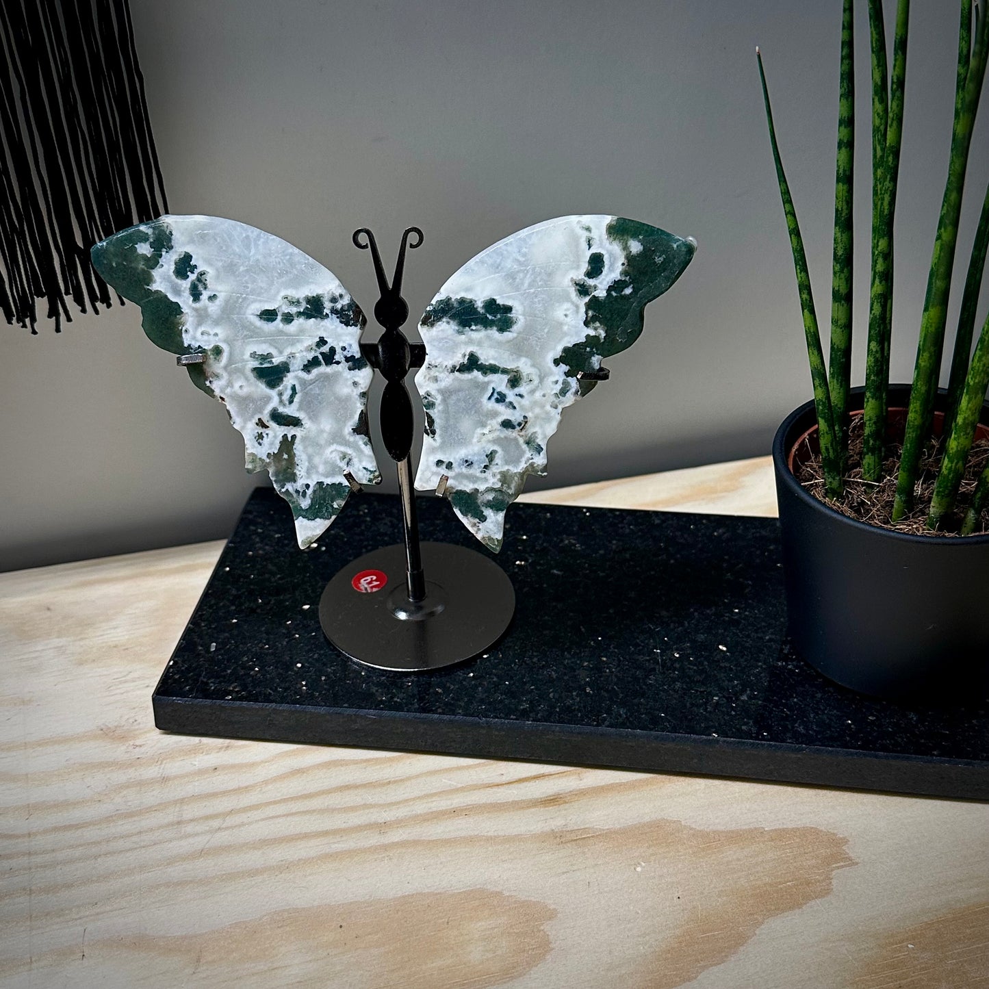 Mosagaat vlinders op standaard