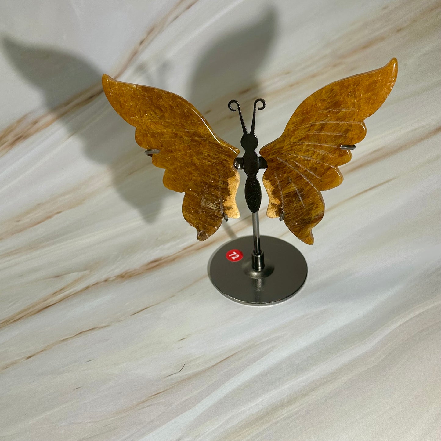 Golden healer vlinders op standaard