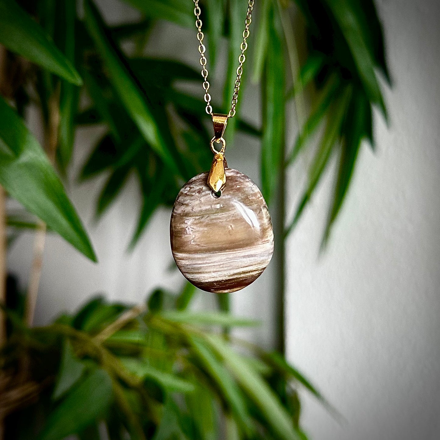 Versteend hout kettinghangers - goud