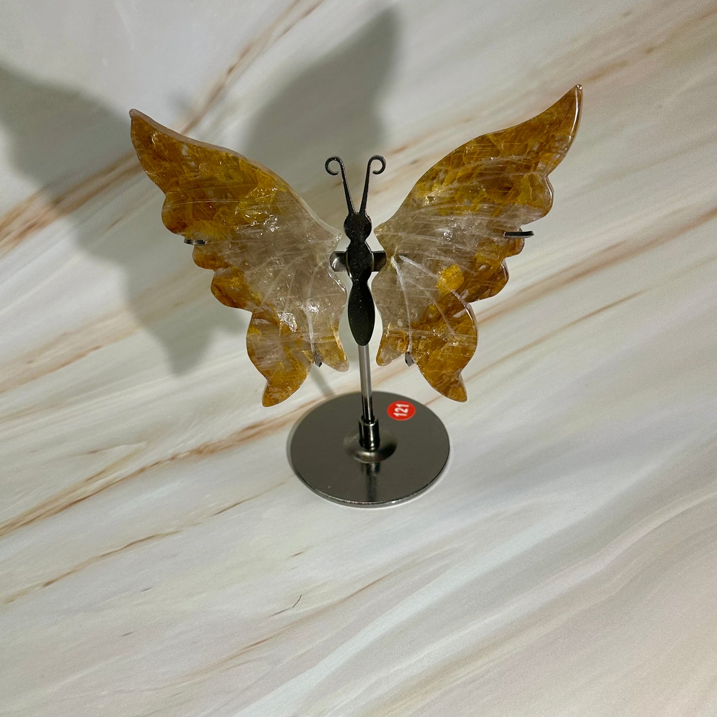 Golden healer vlinders op standaard