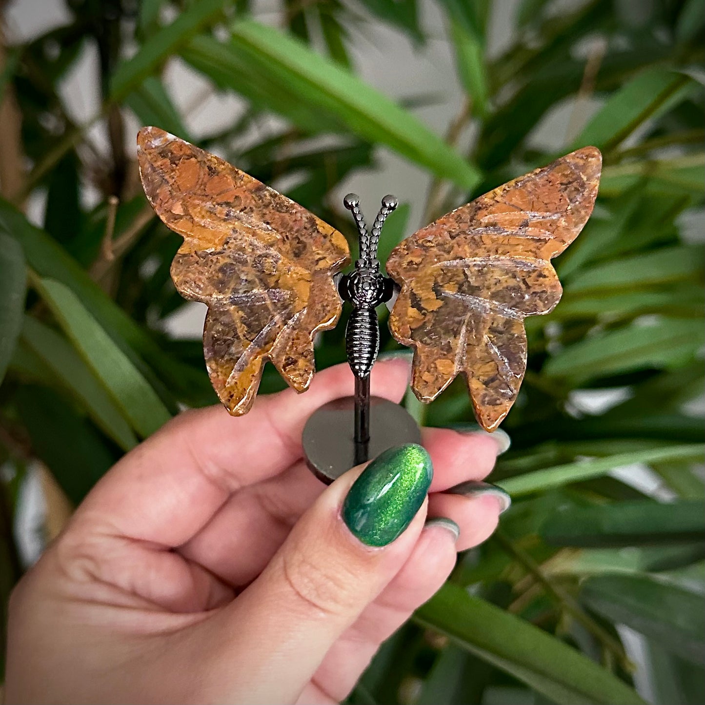 Kleine vlinder op standaard