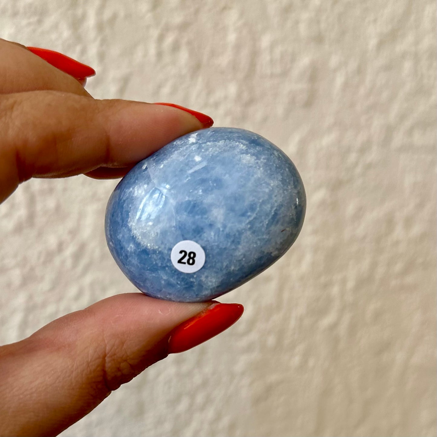 Blauwe calciet handstenen