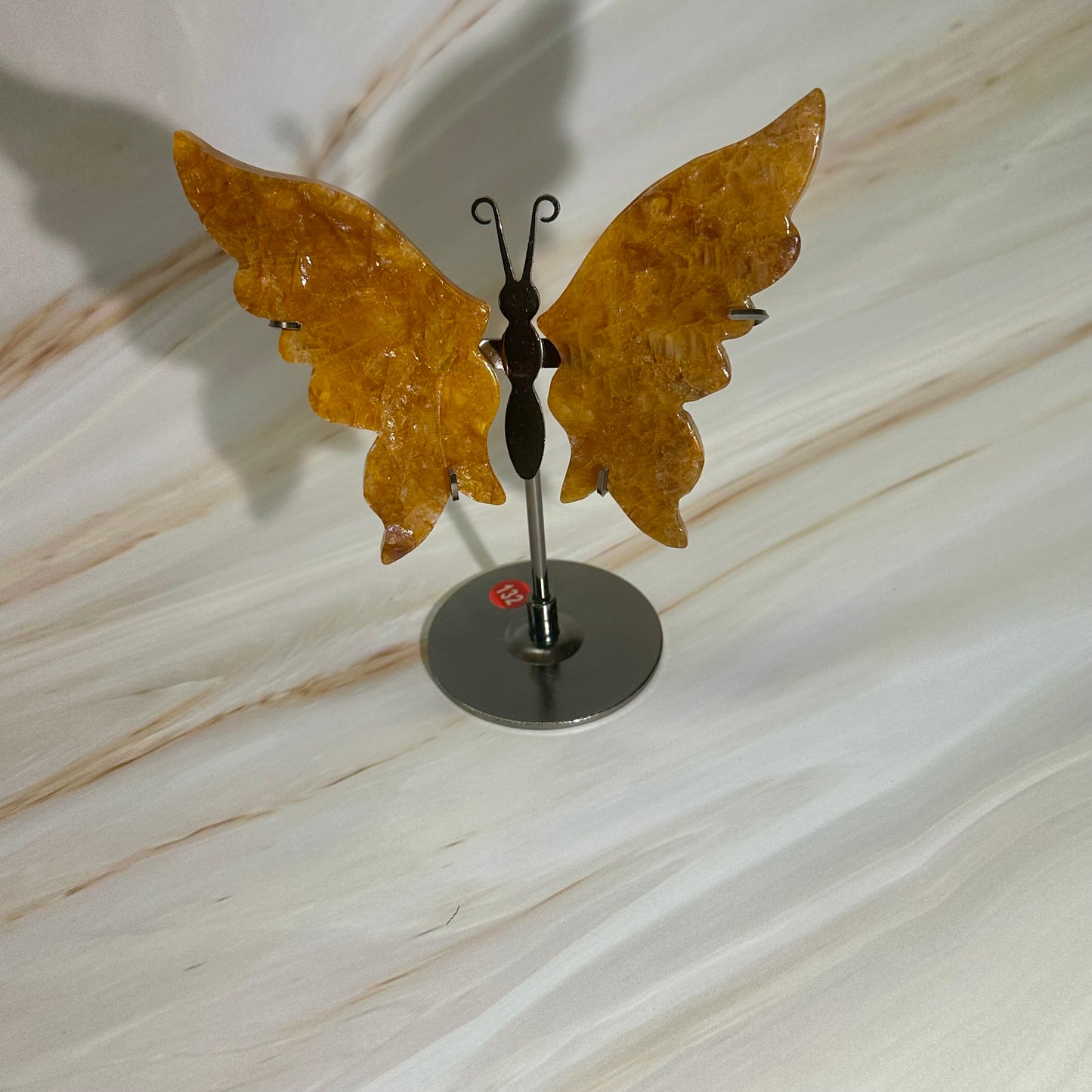 Golden healer vlinders op standaard