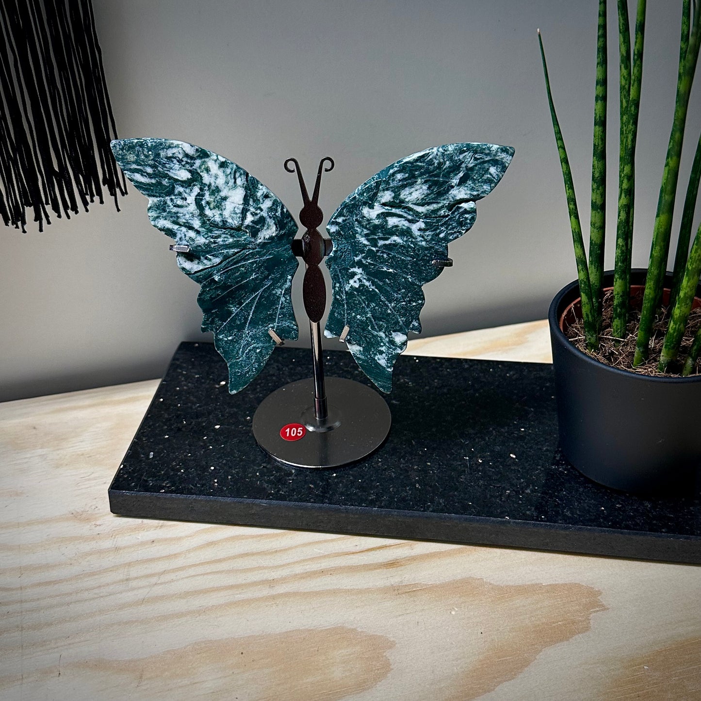 Mosagaat vlinders op standaard