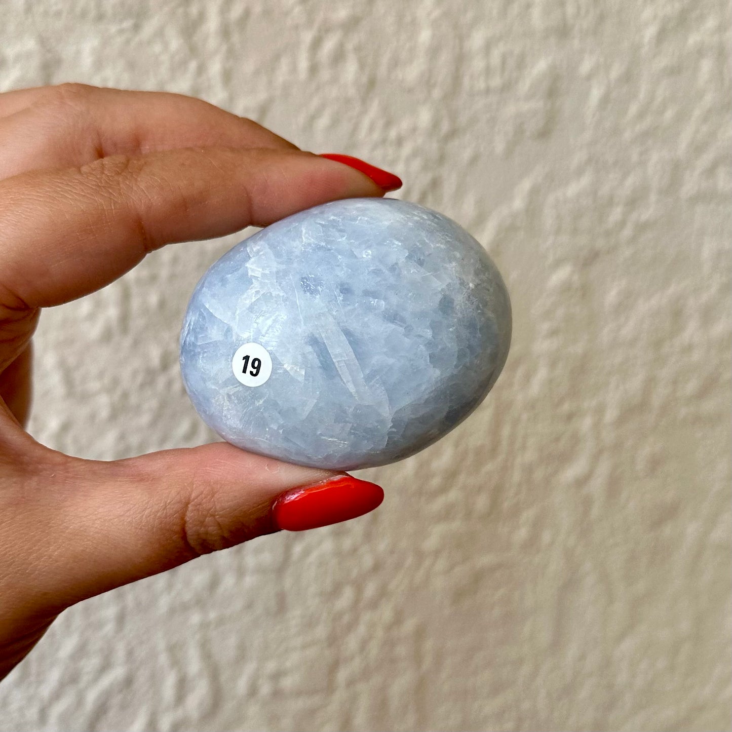 Blauwe calciet handstenen