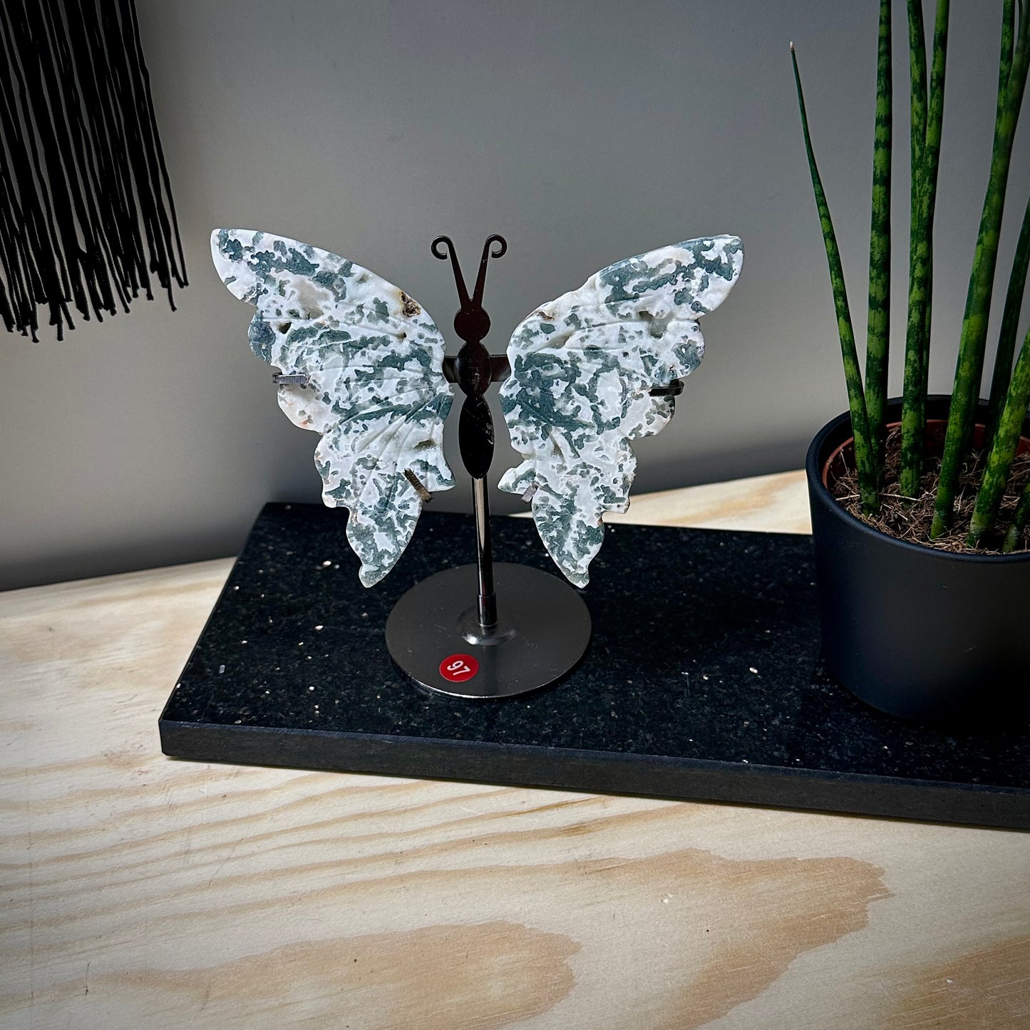 Mosagaat vlinders op standaard