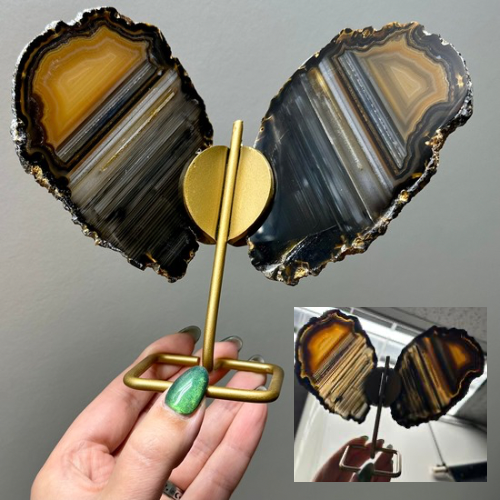 Agaat vlinder op goud standaard