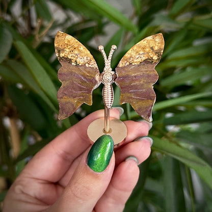 Kleine vlinder op standaard