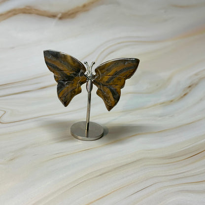 Kleine vlinder op standaard zilver