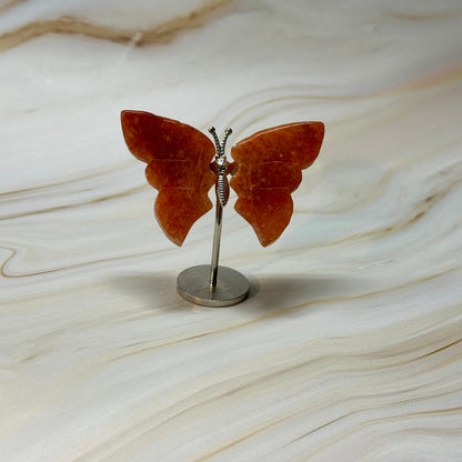 Kleine vlinder op standaard zilver