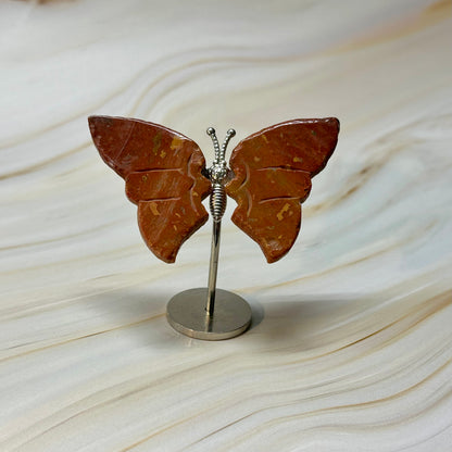 Kleine vlinder op standaard zilver