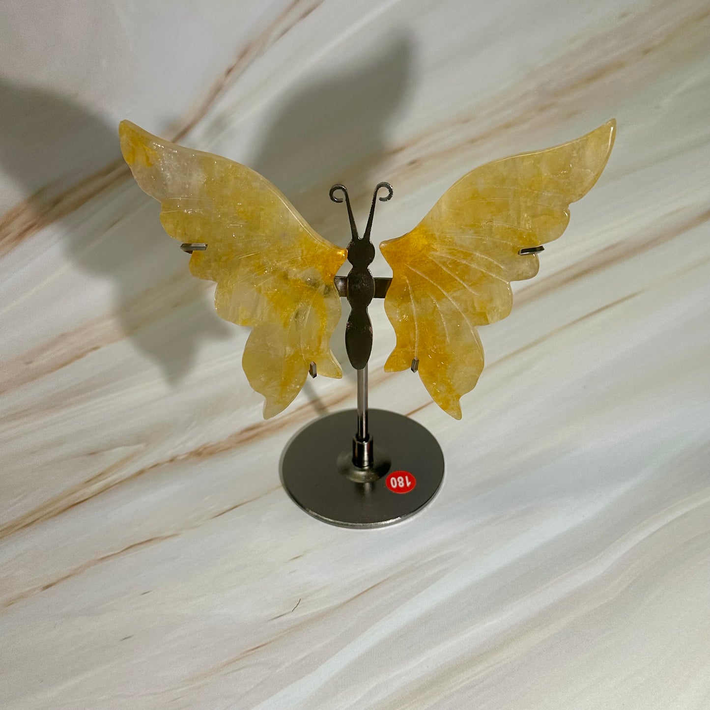 Golden healer vlinders op standaard