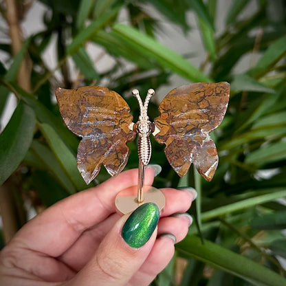 Kleine vlinder op standaard