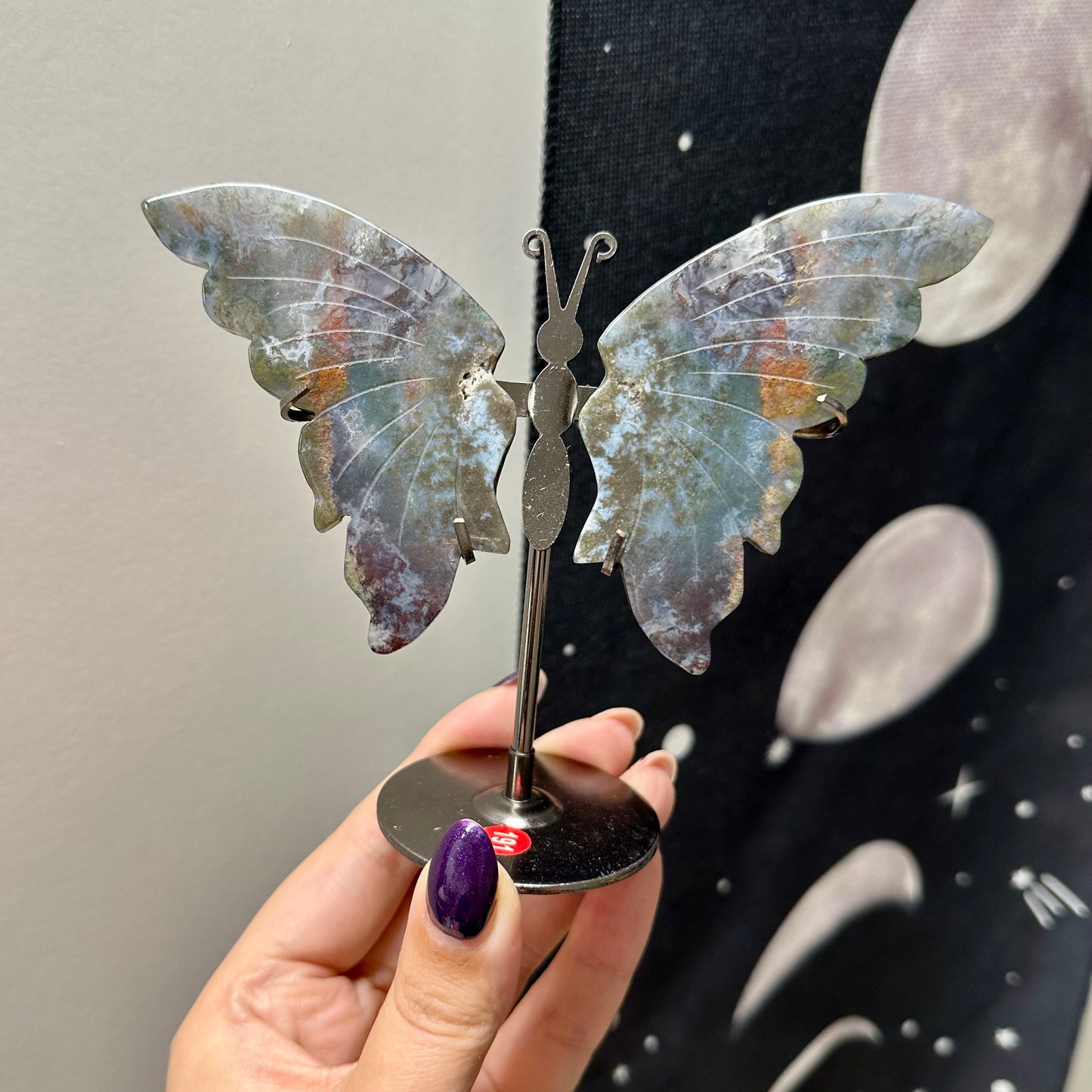 Mosagaat vlinders op standaard